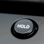 what is the hold button on toyota corolla